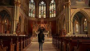 A person walking the aisle of a church